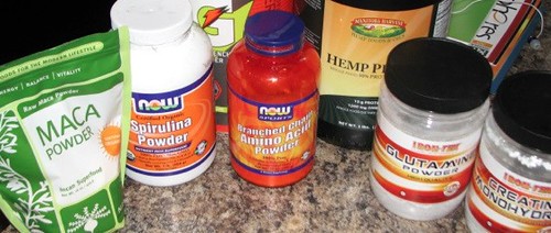 Placeholder image — creatine tub and scoop of unflavoured powder