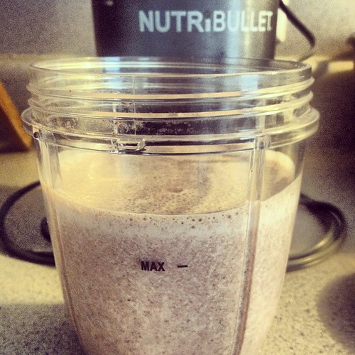 Placeholder image — mass gainer tub with a scoop of powder